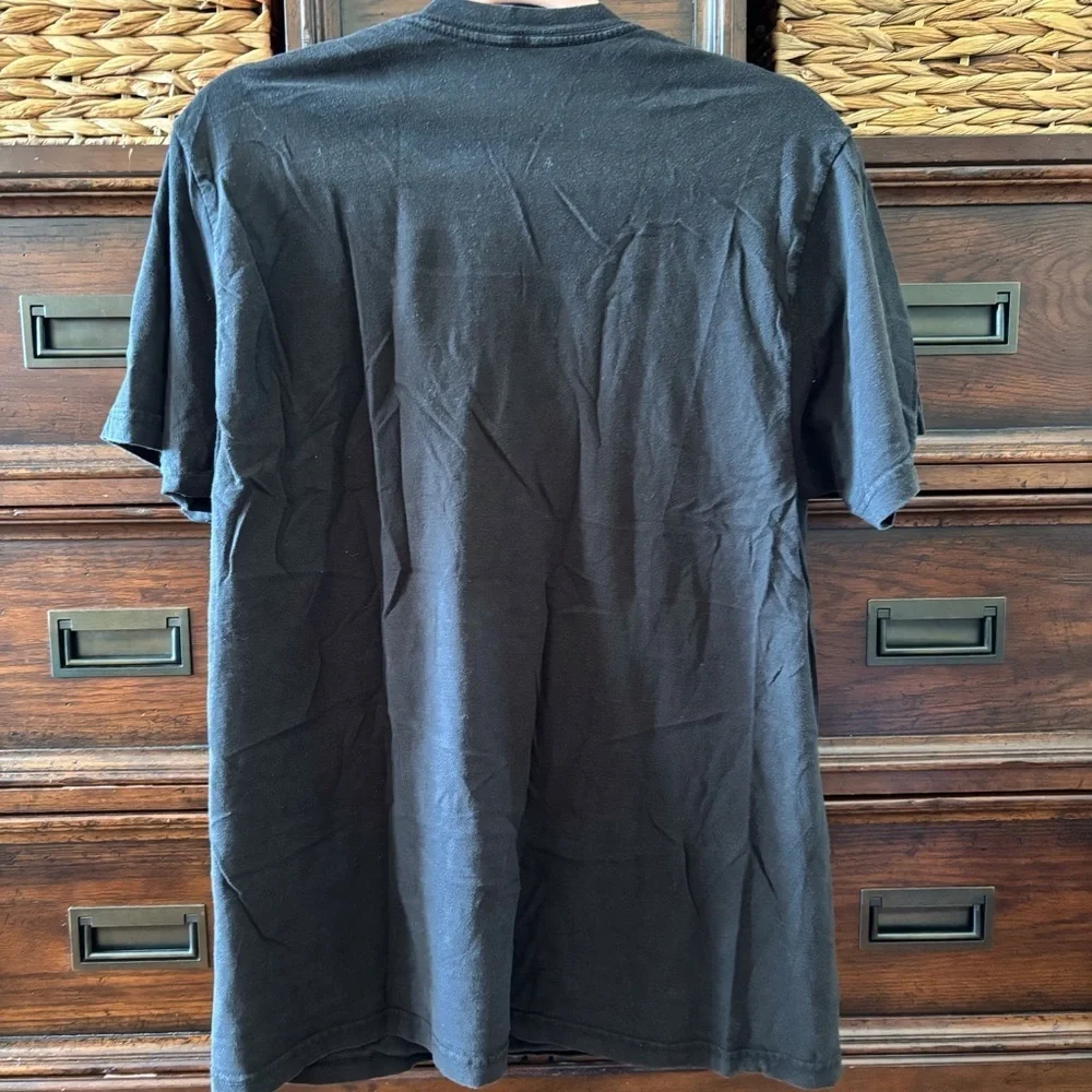 Vintage Ringling Bros black short sleeve graphic tee in size L